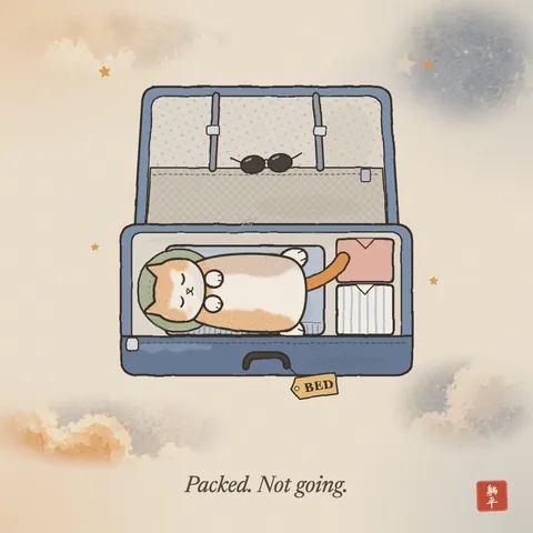 An open suitcase, neatly packed with folded clothes and sunglasses. A ginger-and-white cat is asleep on its back right in the middle, head on a travel pillow. The luggage tag says BED. Caption: Packed. Not going.